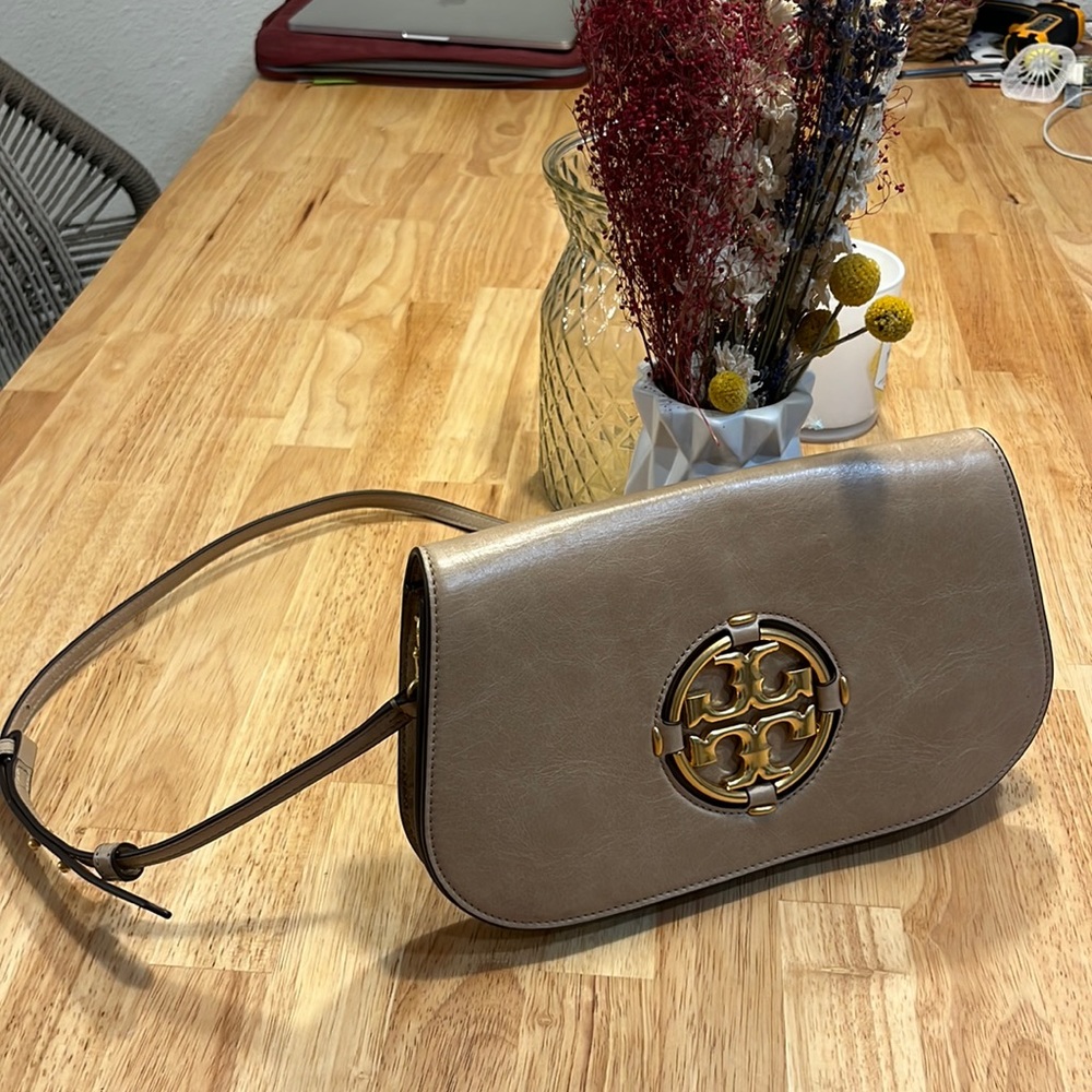 Like new Tory Burch beige bag. 1 year old worn twice